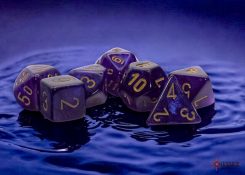 7-Die Set Mega-hedrals Borealis Luminary: Royal Purple/Gold with background